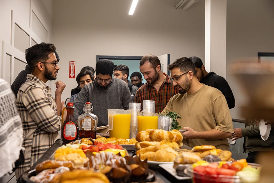 ISNA Canada Youth group together getting food